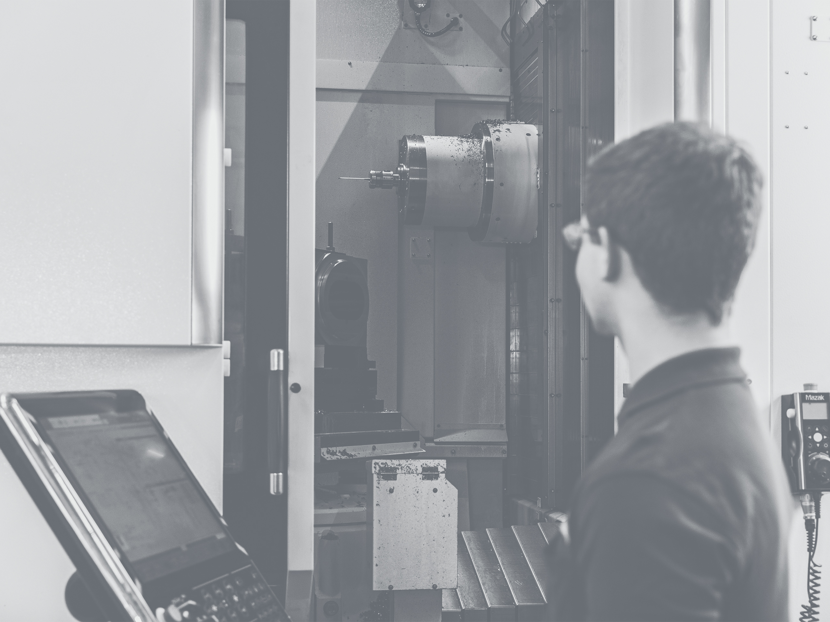 An employee checks the correct operation of the new horizontal high-speed milling center from Yamazaki Mazak.